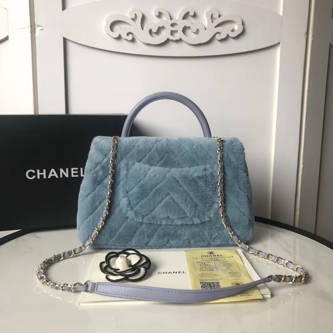 Chanel flap bag with top handle A92991 light blue