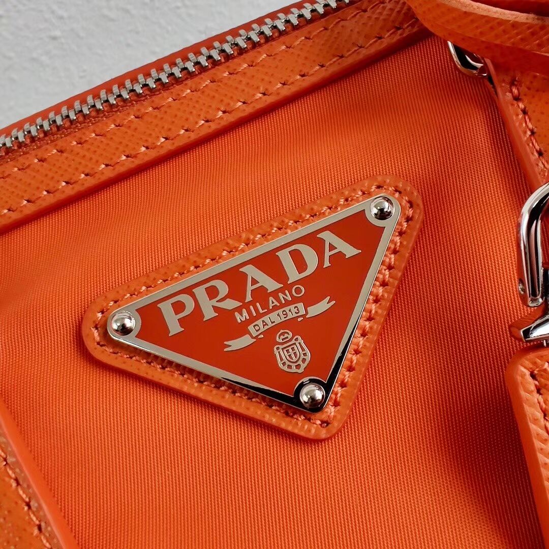 Prada Re-Edition 2005 top-handle bag 1PR846 orange