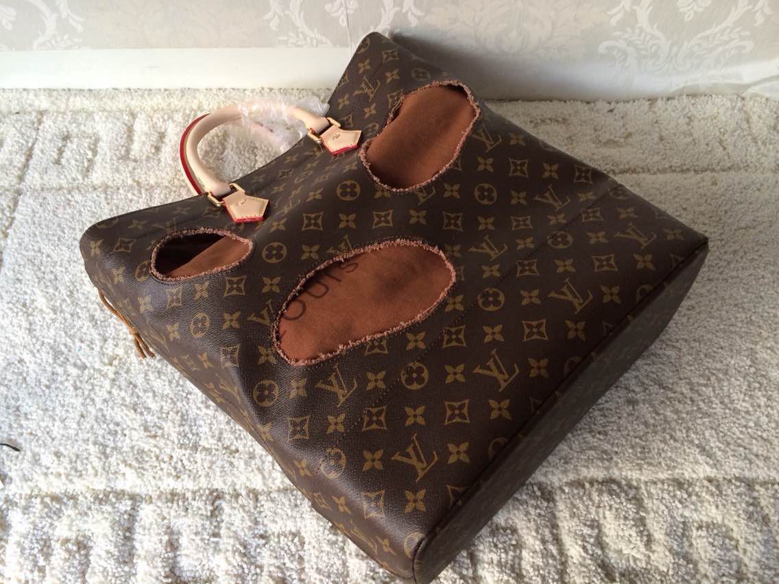 Louis Vuitton Original Leather Monogram canvas BAG WITH HOLES REI KAWAKUBO M40279