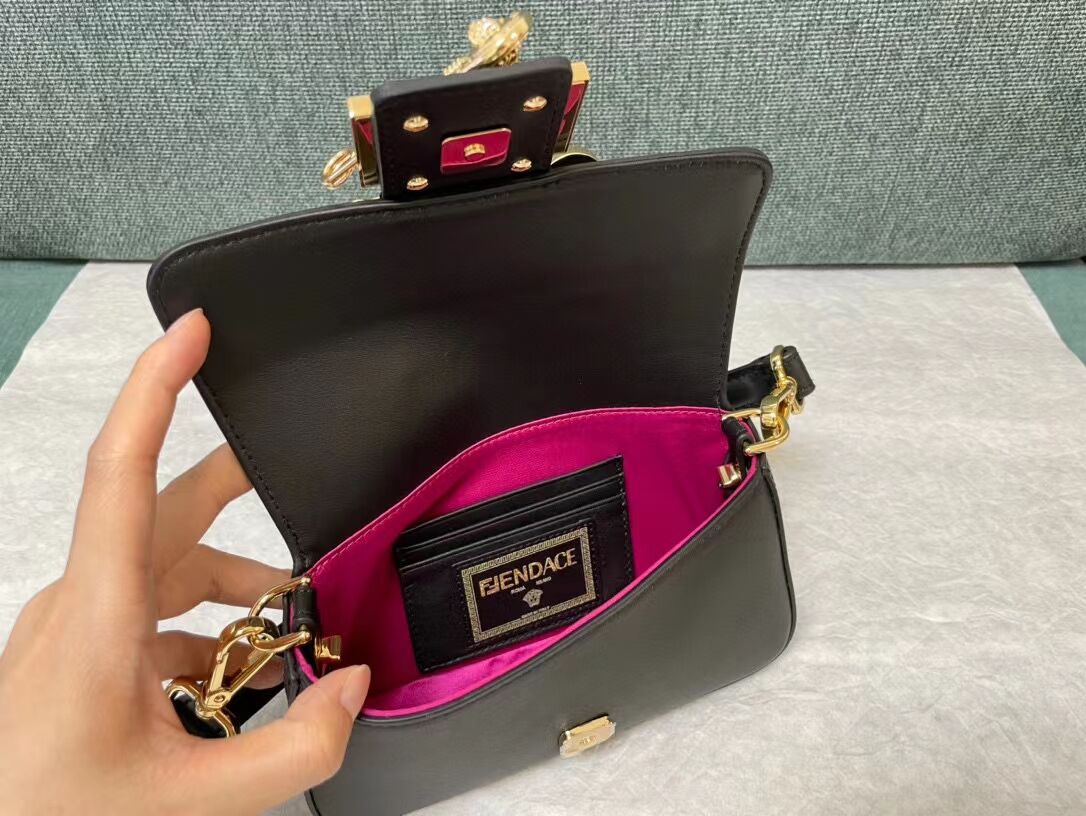 Fendi Brooch mini baguette Fendace leather bag 8BS066A black