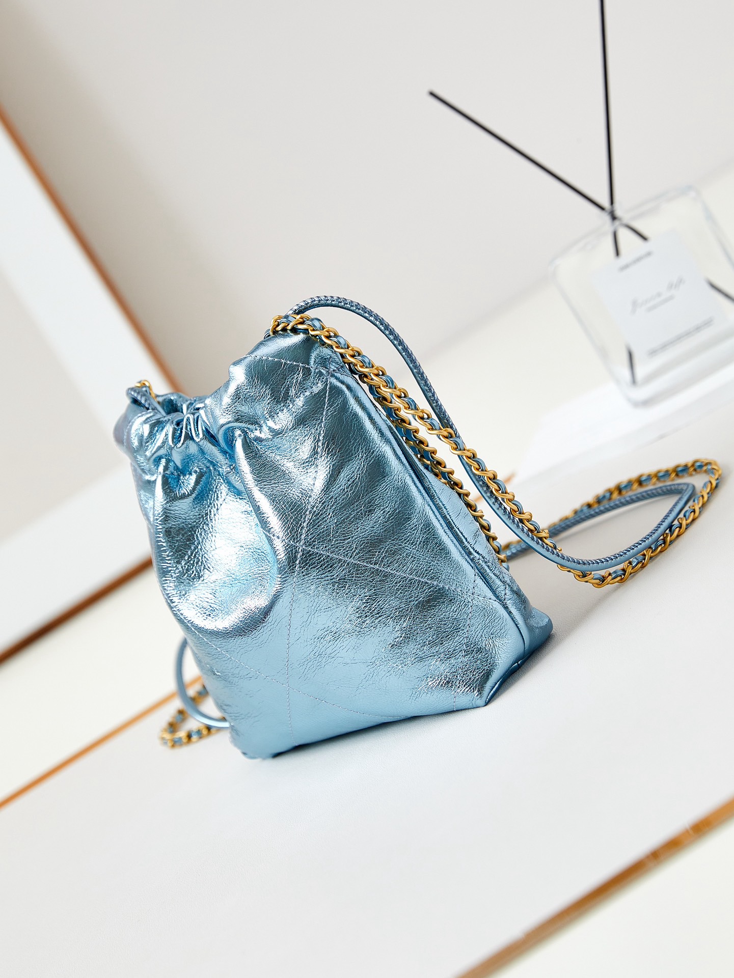 CHANEL 22 MINI HANDBAG AS3980 Pearlescent blue