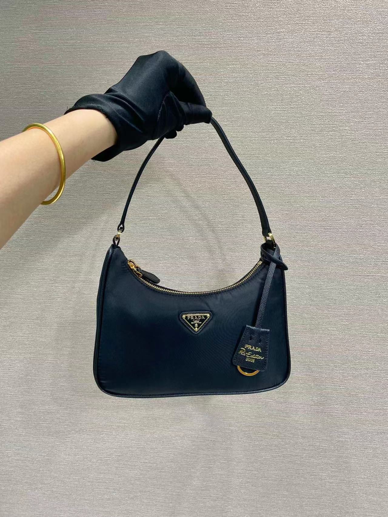 Prada Re-Nylon and brushed leather mini-bag 1BC515 black